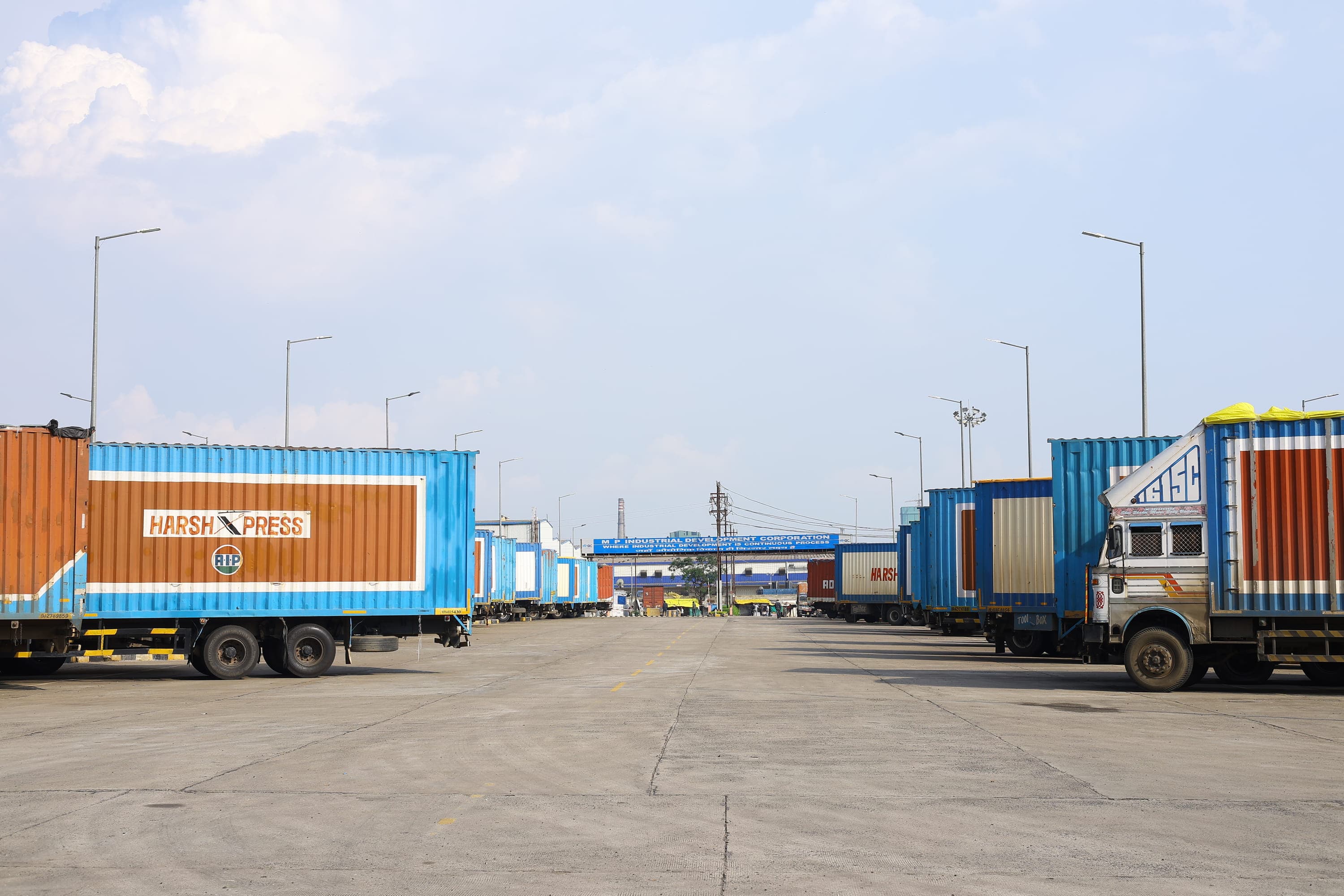 Harsh Express trucks at the fleet yard